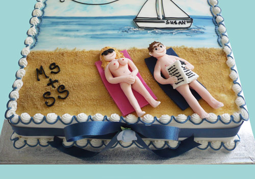 Nude sunbathers on the beach cake